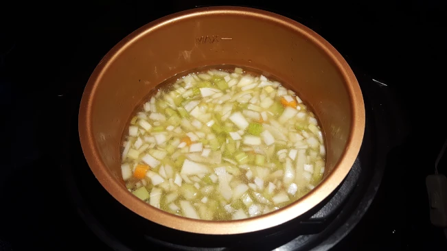 chopped veg and chicken stock in pressure veg-stock-pressure-cooker