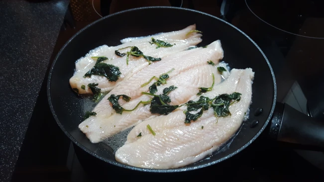 fish fillets in a pan