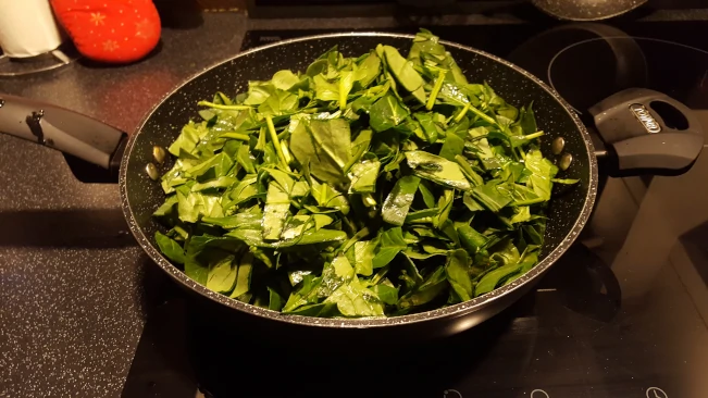 spinach added to pan