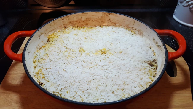 cooked lamb pualao rice straight from the oven cooked lamb pualao rice in pan
