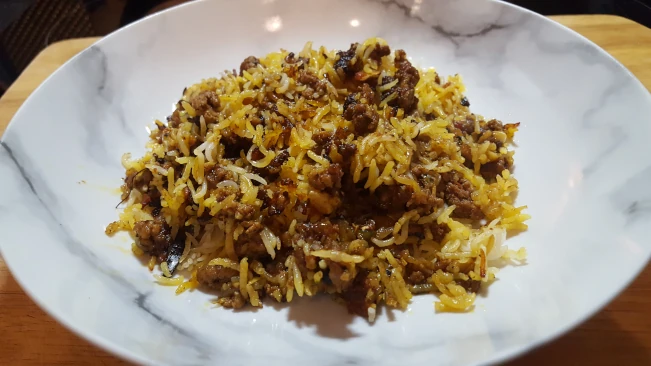 lamb pulao rice served in a dish lamb pulao rice in dish