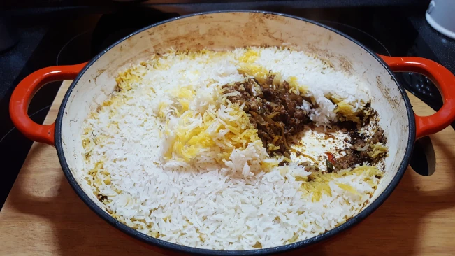 meat revealed under rice of lamb pualao meat revealed under rice
