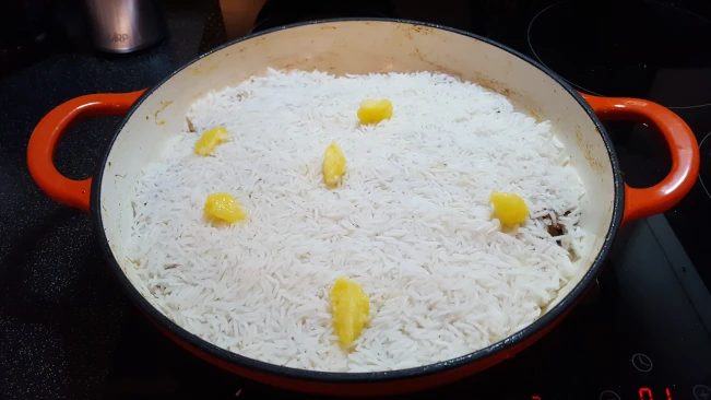 rice dotted with ghee for lamb pulao rice rice dotted with ghee
