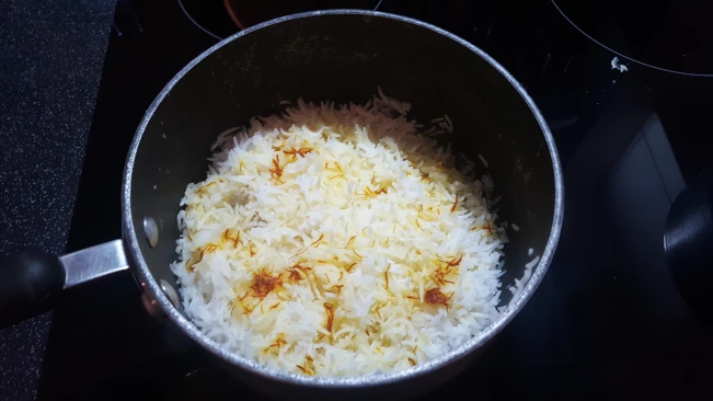 saffron milk poured on rice